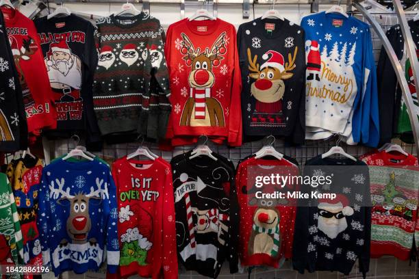 Festive Rudolph the red nose reindeer Christmas jumpers for sale on 7th December 2023 in London, United Kingdom. Once an item of riducule, the...