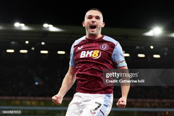 John McGinn of Aston Villa celebrates scoring their team's first goal during the Premier League match between Aston Villa and Arsenal FC at Villa...