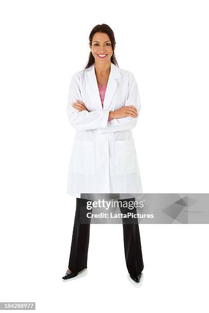 smiling mid adult female wearing lab coat arms crossed - scientist full length stock pictures, royalty-free photos & images