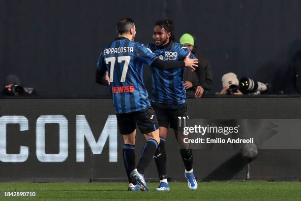 Ademola Lookman of Atalanta BC celebrates with teammate Davide Zappacosta after scoring their team's first goal during the Serie A TIM match between...