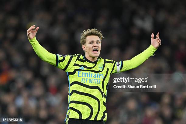 Martin Odegaard of Arsenal reacts during the Premier League match between Aston Villa and Arsenal FC at Villa Park on December 09, 2023 in...