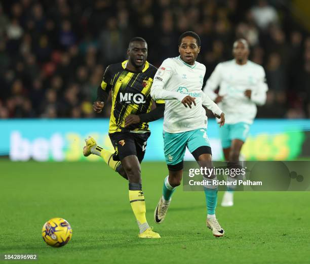 Ken Sema of Watford in action with Kyle Walker-Peters of Southampton the Sky Bet Championship match between Watford and Southampton FC at Vicarage...