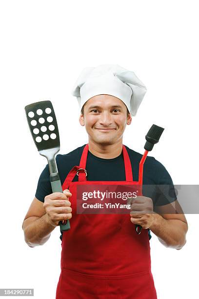 happy man grilling chef in red isolated on white background - apron isolated stockfoto's en -beelden