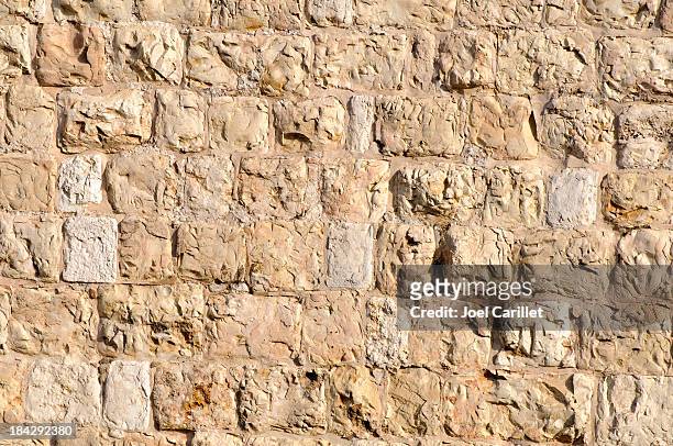 ottoman-era stone wall surrounding the old city of jerusalem - jerusalem stock pictures, royalty-free photos & images