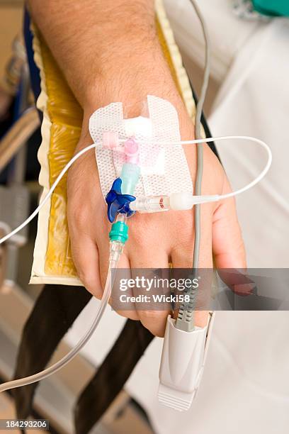 iv drip and oximeter - catheter stock pictures, royalty-free photos & images