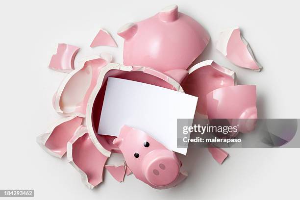 savings. broken piggy bank with blank note. - smashed piggy bank stock pictures, royalty-free photos & images