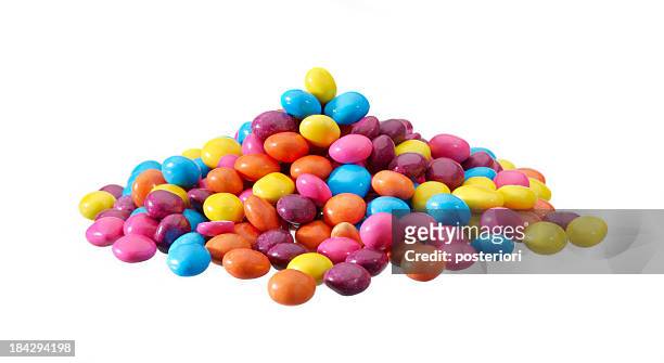 キャンディーに白背景 - pile of candy ストックフォトと画像