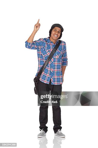 happy university student with finger raised - hand opsteken stockfoto's en -beelden