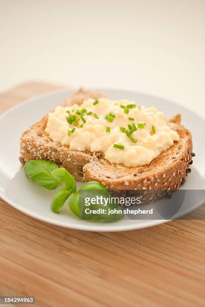 scrambled egg on wholemeal toast - granary stock pictures, royalty-free photos & images