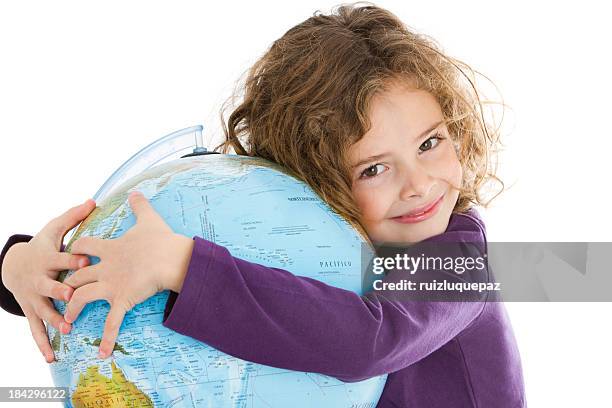 cute little girl hugging a globe - human hair ball stock pictures, royalty-free photos & images