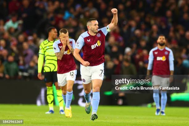 John McGinn of Aston Villa celebrates scoring the opening goal during the Premier League match between Aston Villa and Arsenal FC at Villa Park on...