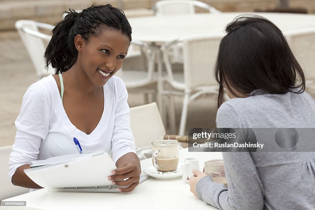 Interview meeting at cafe.