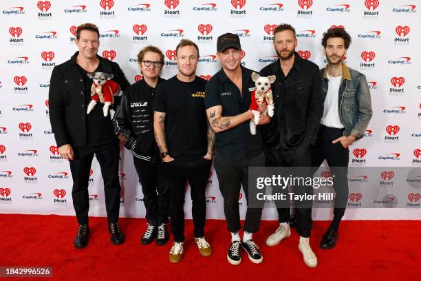 Zach Filkins, Drew Brown, Brent Kutzle, Ryan Tedder, Eddie Fisher, and Brian Willett of OneRepublic attend iHeartRadio z100's Jingle Ball 2023 at...