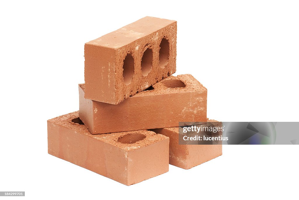 Four red bricks isolated on white