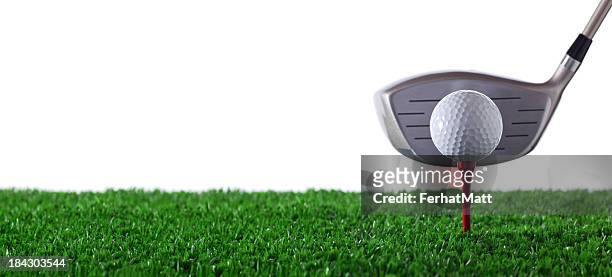 golf club next to golf ball on red tee on grass - golf tee stock pictures, royalty-free photos & images