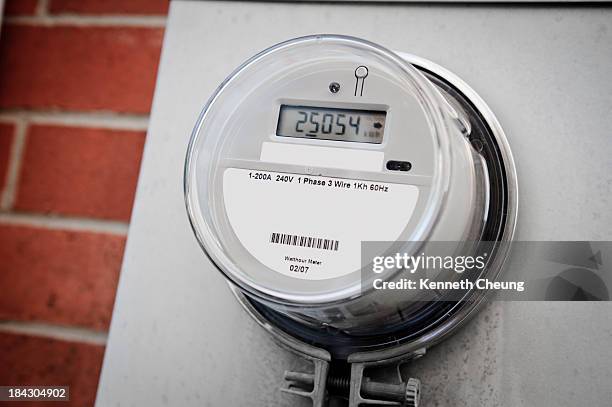 smart energy meter - electricity meter stock pictures, royalty-free photos & images