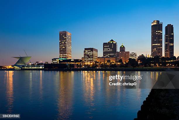 milwaukee lakefront and skyline at dusk - milwaukee wisconsin stock pictures, royalty-free photos & images