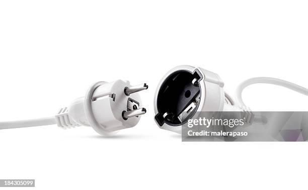 electric power cable with plug and socket unplugged - power point stock pictures, royalty-free photos & images