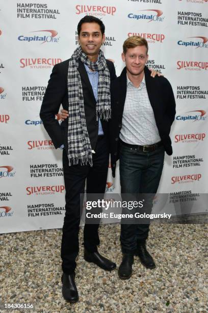 Chief Curator, Film at MoMA Rajendra Roy and Marc Ohrem-Leclef attend the 21st Annual Hamptons International Film Festival on October 12, 2013 in...