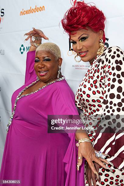 Comedians Luenell and Flame Monroe attends the 23rd Annual HIV/AIDS benefit concert DIVAS Simply Singing! at Club Nokia on October 12, 2013 in Los...