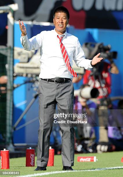 Yokohama F.Marinos head coach Yasuhiro Higuchi gestures during the Yamazaki Nabisco Cup semi final second leg match between Yokohama F.Marinos and...
