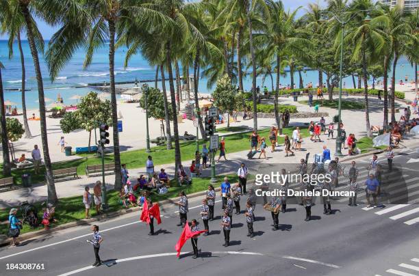 Students performing at Flower Parade in Waikiki, Honolulu, Oahu, during the Aloha Festival. Aloha Festivals celebrate Hawaiian culture, music, dance,...