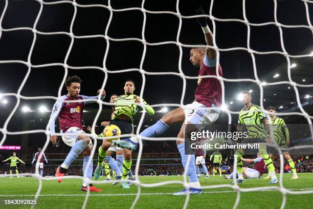 Diego Carlos and Boubacar Kamara of Aston Villa clear the ball from the goal line during the Premier League match between Aston Villa and Arsenal FC...