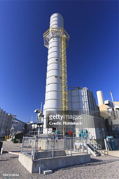 gas turbine exhaust stack at an electric cogeneration plant - gasturbine stockfoto's en -beelden