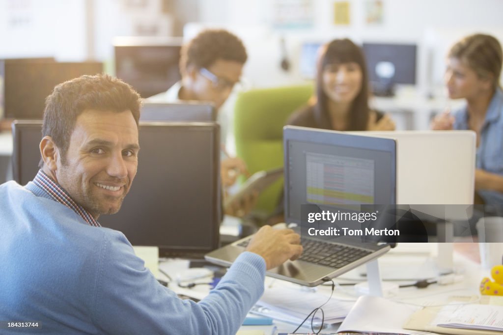 Businessman working at desk in office