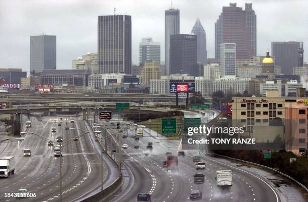 Highways leading into and out of downtown Atlanta, GA remain open under icy conditions 29 January 2000. The Tennessee Titans will play the St. Louis...