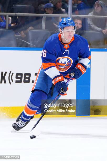 Julien Gauthier of the New York Islanders in action against the San Jose Sharks at UBS Arena on December 05, 2023 in Elmont, New York. San Jose...