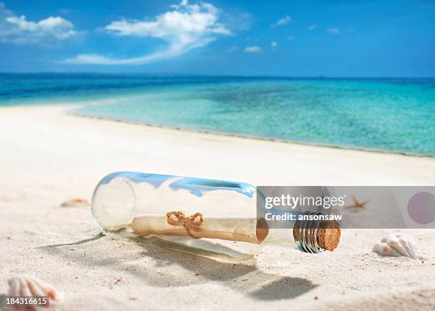 message in a bottle - message stock pictures, royalty-free photos & images