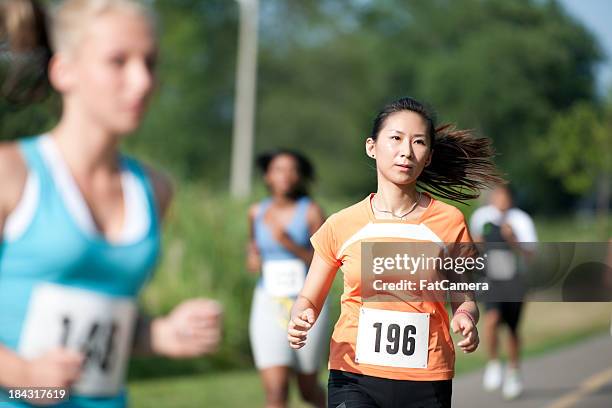 runner - 10000m stock pictures, royalty-free photos & images