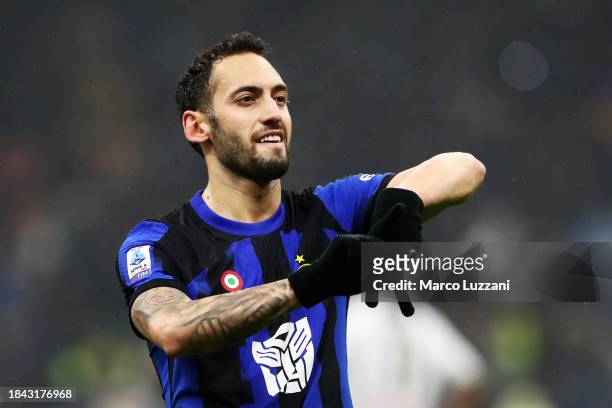Hakan Calhanoglu of FC Internazionale celebrates scoring their team's first goal during the Serie A TIM match between FC Internazionale and Udinese...