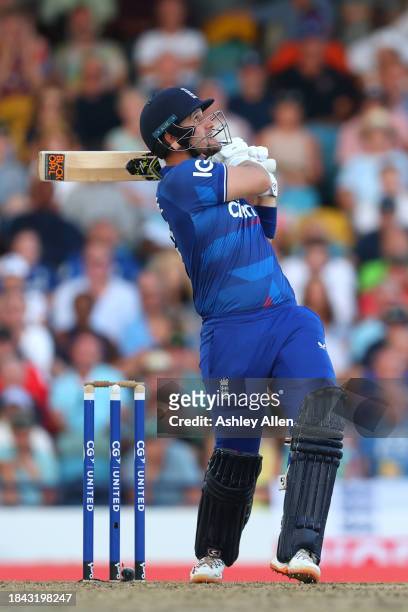 Liam Livingstone of England hits a boundary during the third CG United One Day International match between West Indies and England at Kensington Oval...