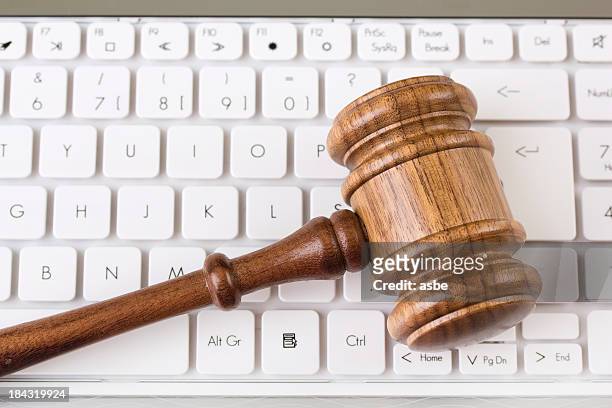 gavel on keyboard - auction stock pictures, royalty-free photos & images