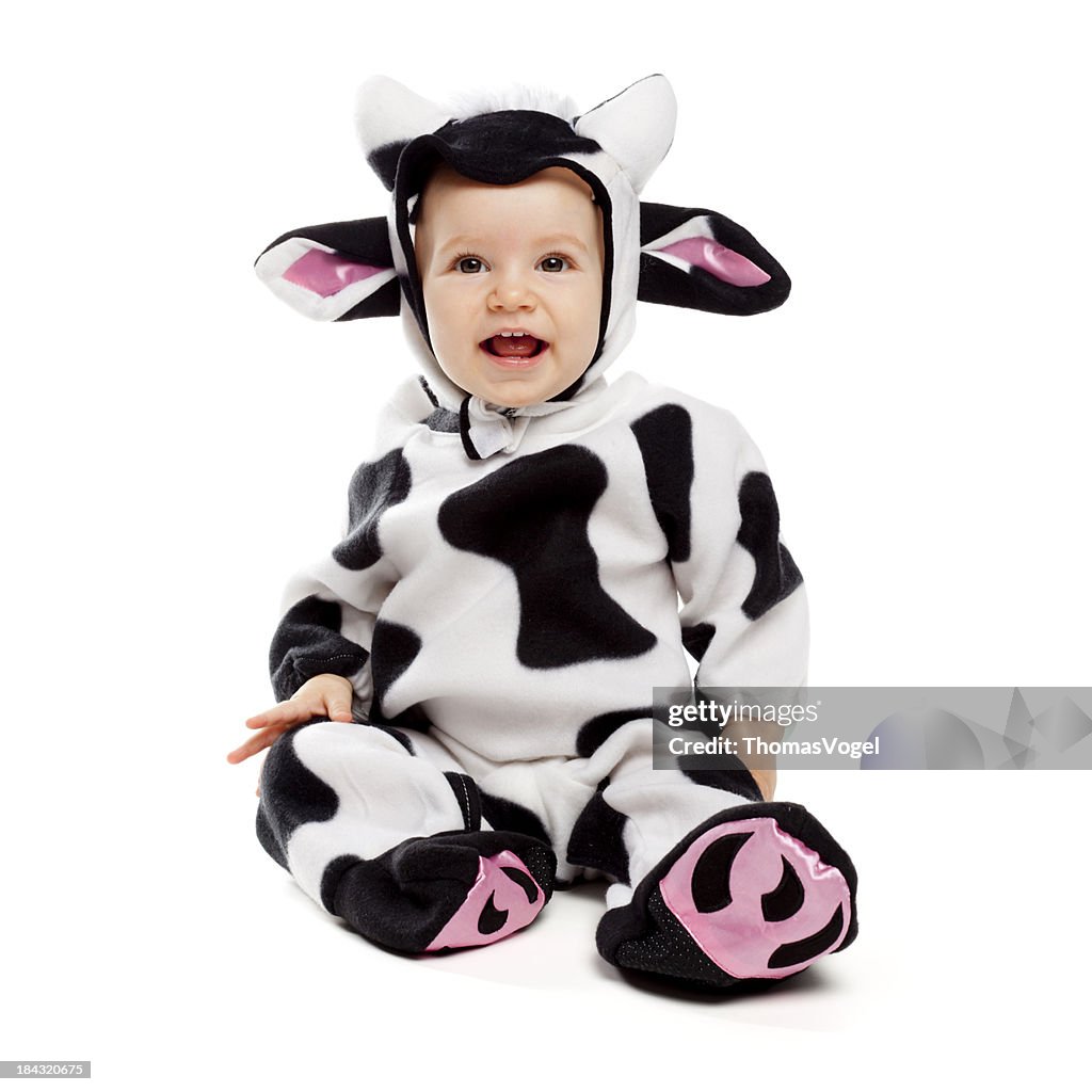 Baby girl in cow costume