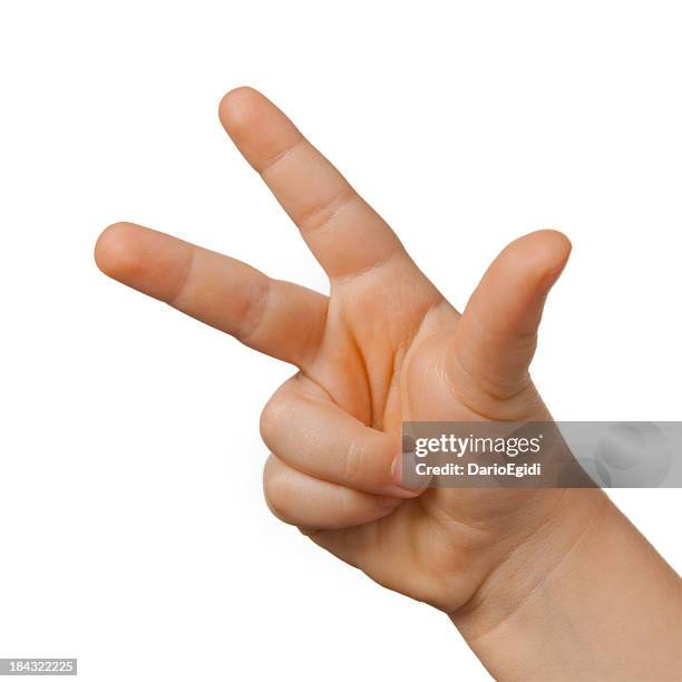 hand of a child making number three on white background - three fingers stock pictures, royalty-free photos & images