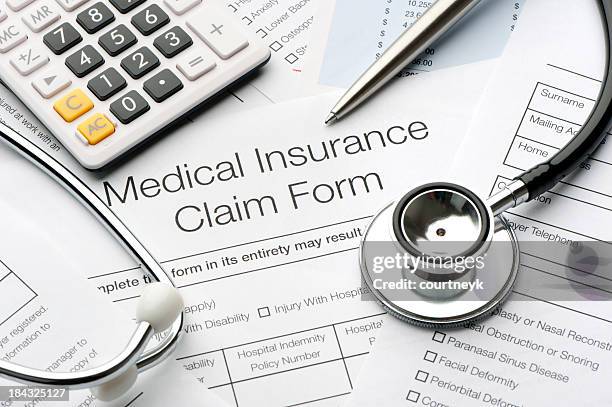 close up of a medical insurance form - health insurance stock pictures, royalty-free photos & images