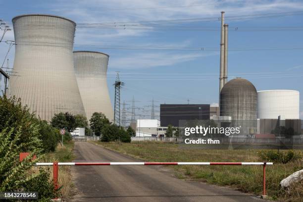 nuclear power plant with closed barrier - cooling tower stock pictures, royalty-free photos & images