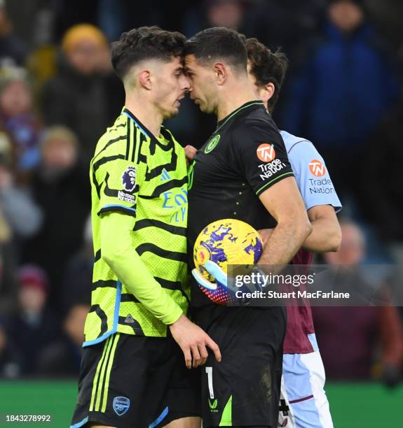 Kai Havertz of Arsenal clashes with Aston Villa goalkeeper Emi Martinez during the Premier League match between Aston Villa and Arsenal FC at Villa...