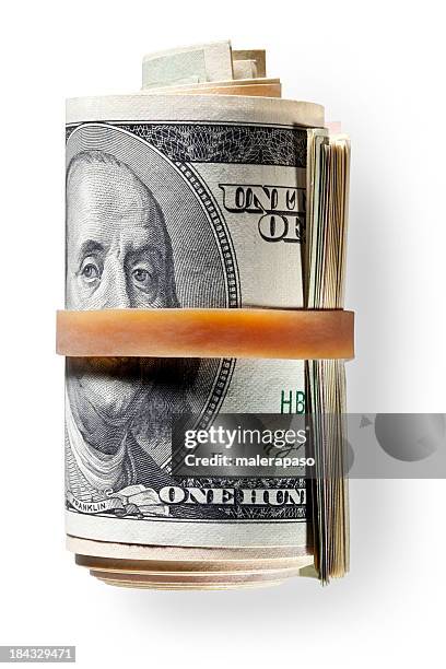 roll of dollar banknotes - money roll stock pictures, royalty-free photos & images