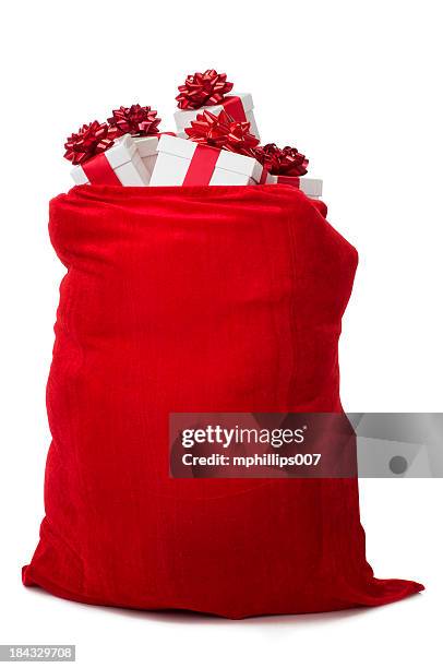 sack of gifts - goodie bag stock pictures, royalty-free photos & images