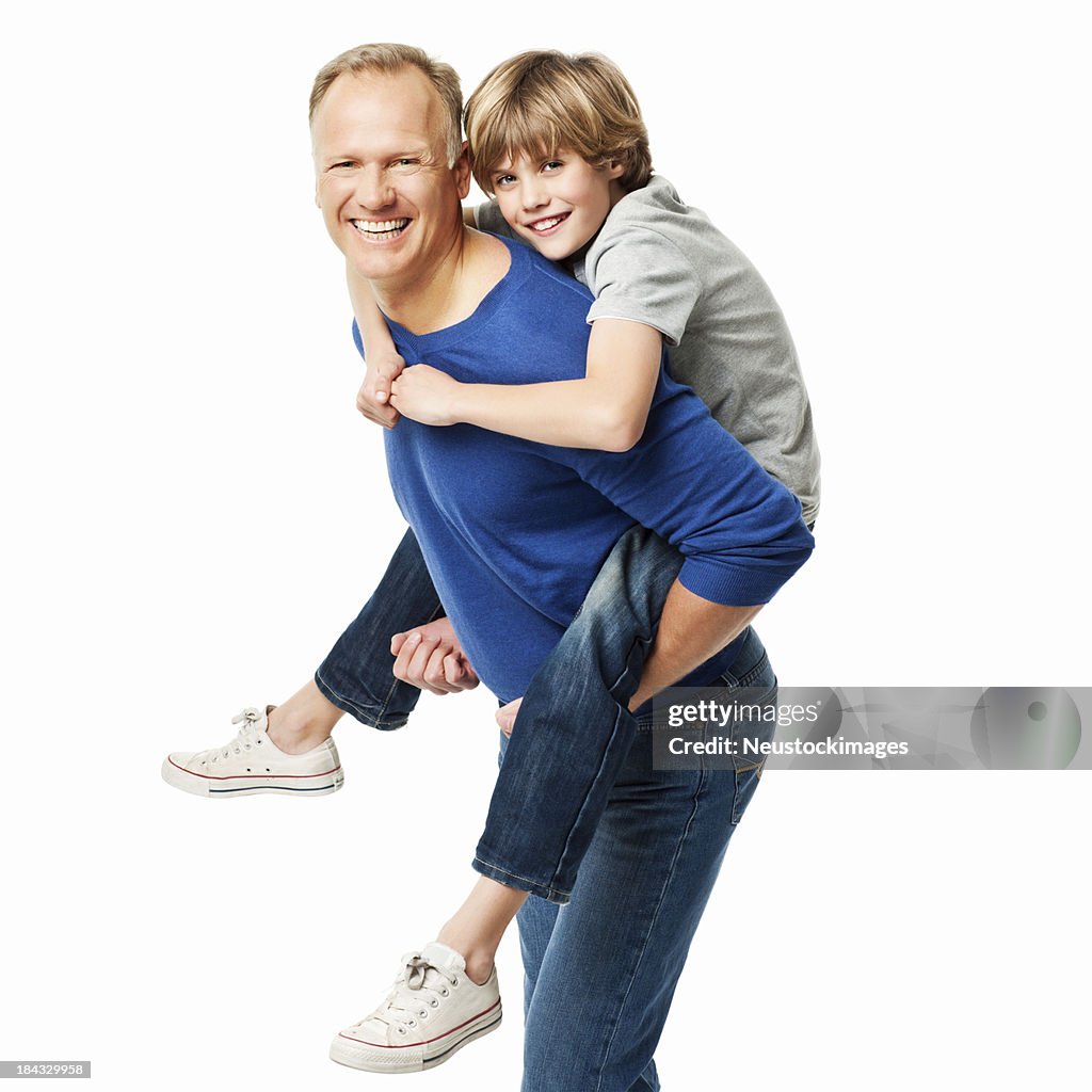 Father Giving His Son a Piggyback Ride - Isolated