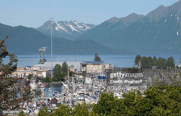 valdez’ small boat harbor and beautiful mountains in background. - valdez stock pictures, royalty-free photos & images