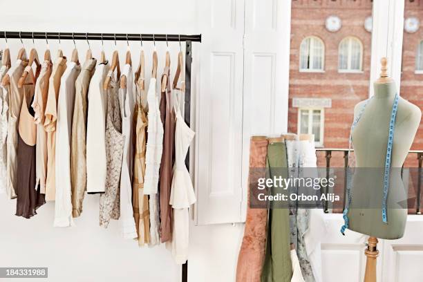 mannequin in fashion designer's studio - coathanger stock pictures, royalty-free photos & images