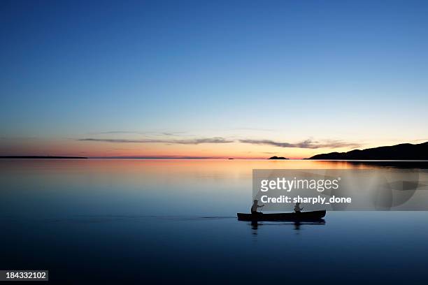 xl twilight canoeing - michigan stock pictures, royalty-free photos & images