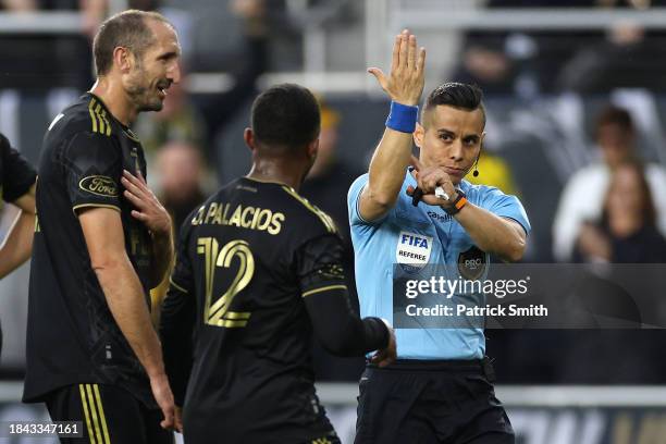 Referee Armando Villarreal signals a hand ball resulting a in Columbus Crew penalty kick during the 2023 MLS Cup against the Los Angeles FC at...