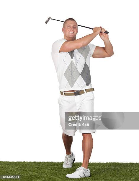 man playing golf - golf swing on white stock pictures, royalty-free photos & images