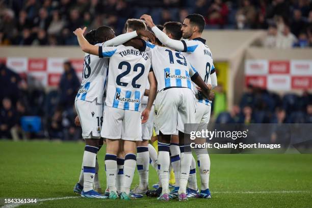 Takefusa Kubo of Real Sociedad celebrates after scoring their side's third goal with his teammates during the LaLiga EA Sports match between...